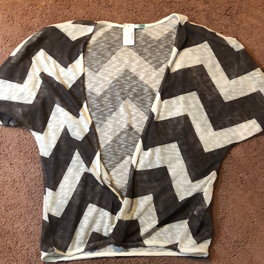 White and black knitted cardigan